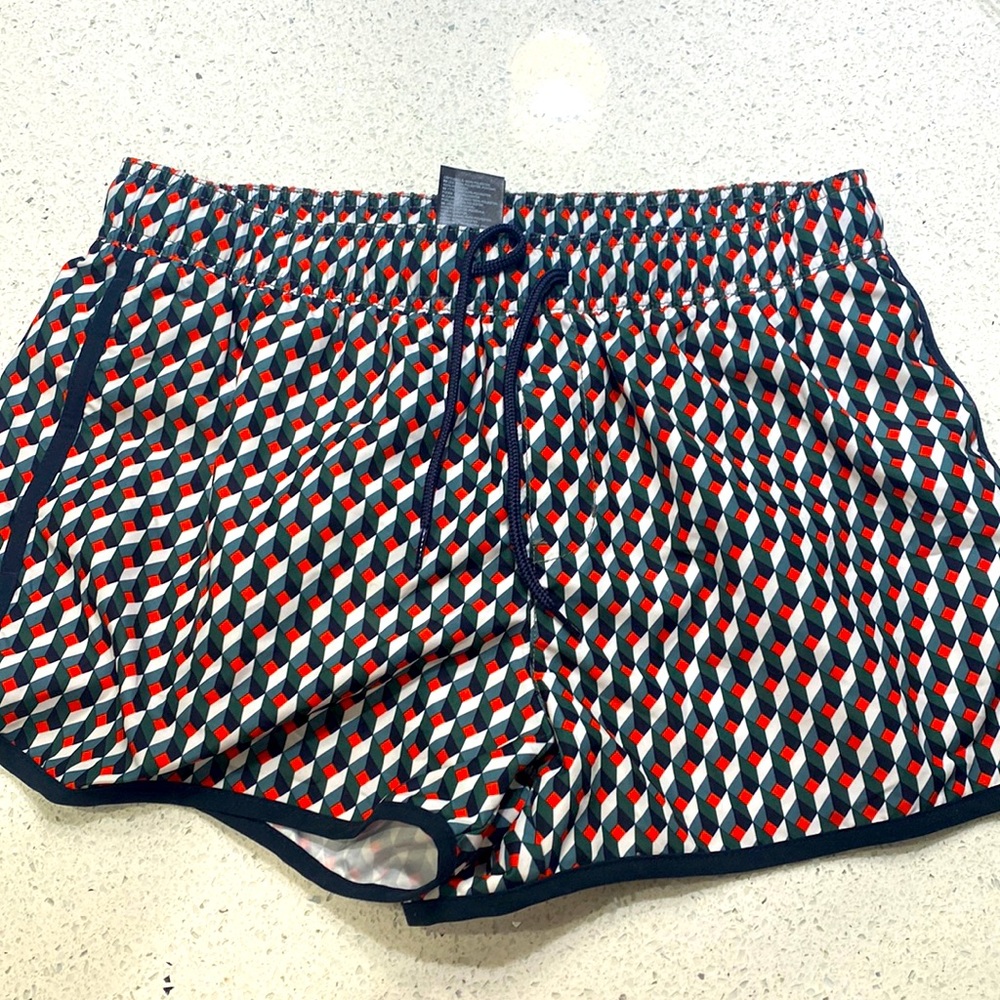 Men’s multicolored (red,green,black, and white) swim trunks with mesh